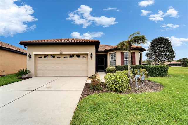 view of front facade featuring a front yard, stucco siding, concrete driveway, a garage, and a tile roof