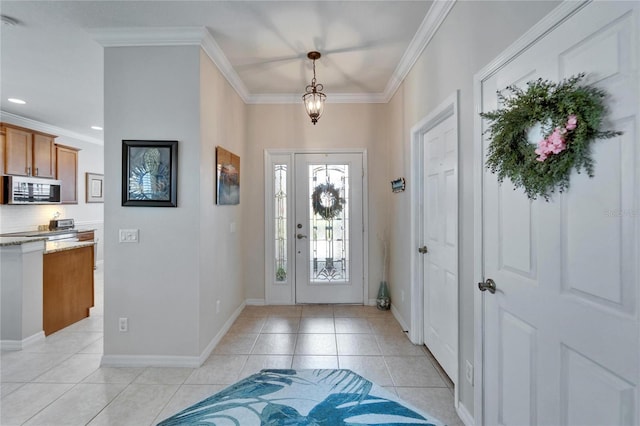 foyer entrance with light tile patterned floors, recessed lighting, baseboards, and ornamental molding