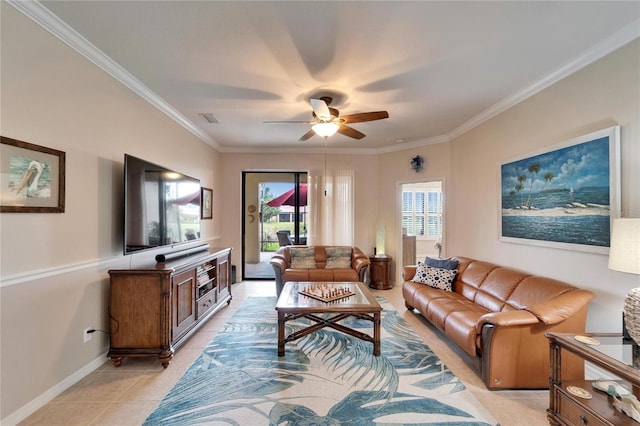 living room featuring light tile patterned floors, baseboards, visible vents, ceiling fan, and ornamental molding