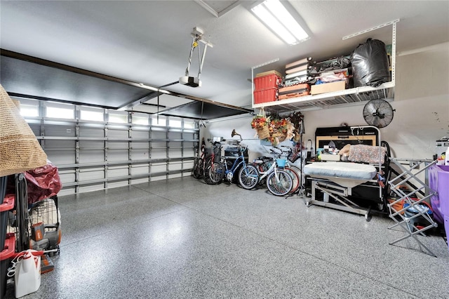 garage featuring a garage door opener