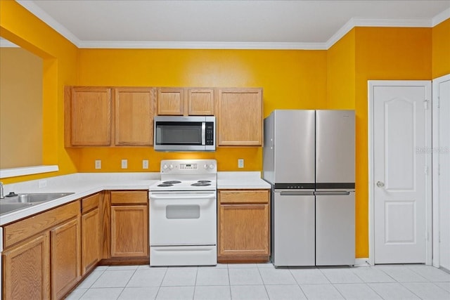 kitchen with light tile patterned flooring, stainless steel appliances, a sink, light countertops, and crown molding