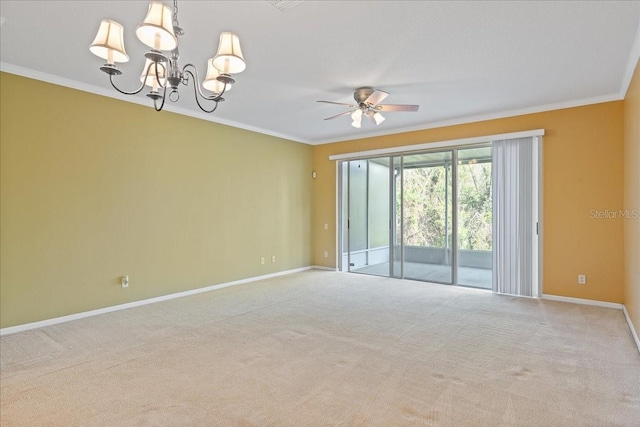 carpeted spare room featuring crown molding, baseboards, and ceiling fan with notable chandelier