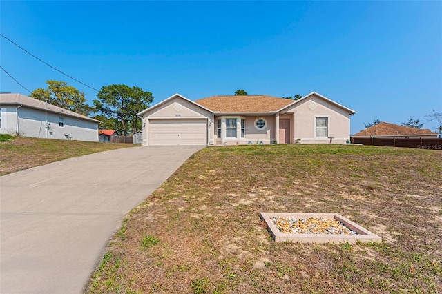 ranch-style house featuring stucco siding, driveway, a front lawn, fence, and an attached garage