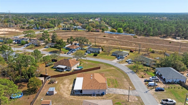 aerial view with a wooded view