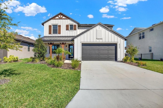 modern inspired farmhouse with a standing seam roof, a front lawn, fence, and board and batten siding