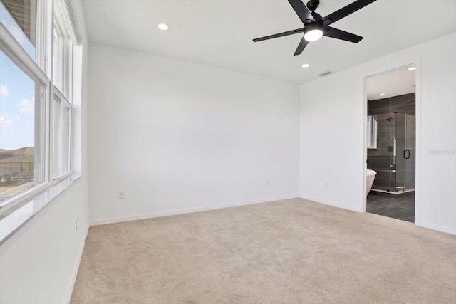 unfurnished bedroom with visible vents, baseboards, carpet floors, recessed lighting, and connected bathroom