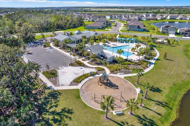 birds eye view of property with a residential view