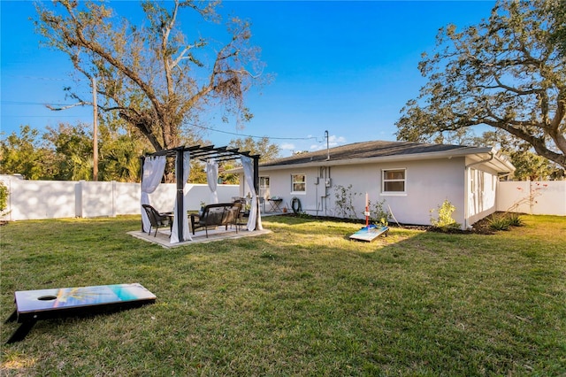 rear view of property with a patio area, a fenced backyard, a lawn, and stucco siding