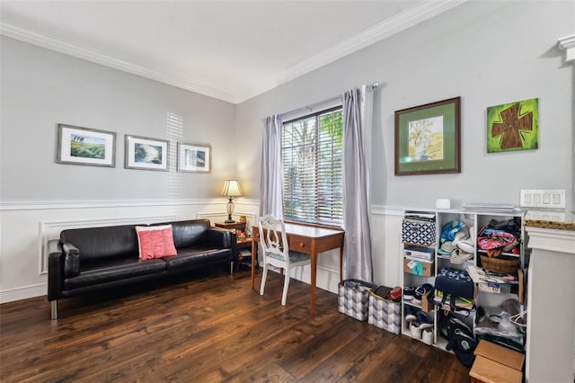 sitting room featuring crown molding and wood finished floors