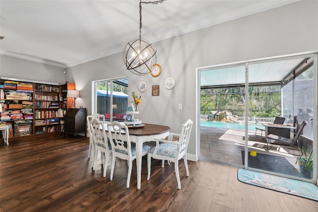 dining area with an inviting chandelier, ornamental molding, a sunroom, baseboards, and hardwood / wood-style flooring