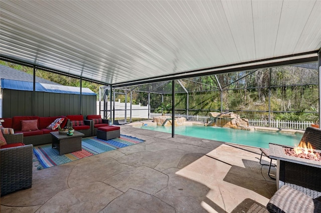 view of swimming pool with a patio, a shed, and an outdoor living space