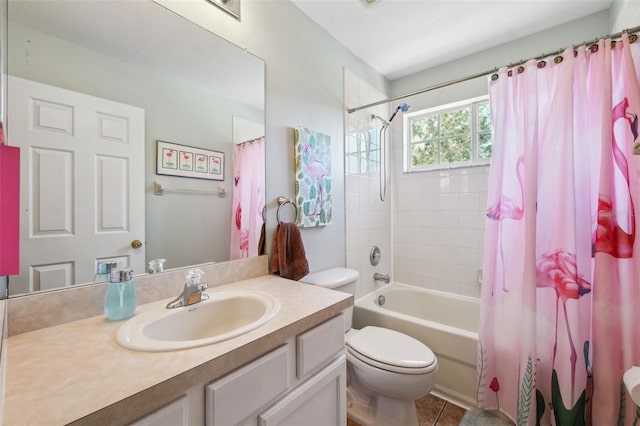 full bathroom featuring shower / bathtub combination with curtain, vanity, and toilet