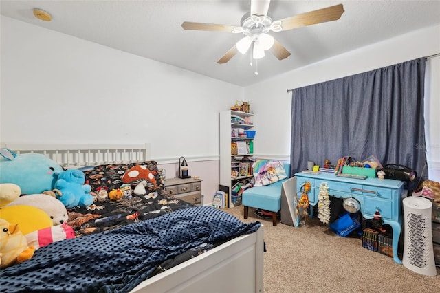 carpeted bedroom with a ceiling fan