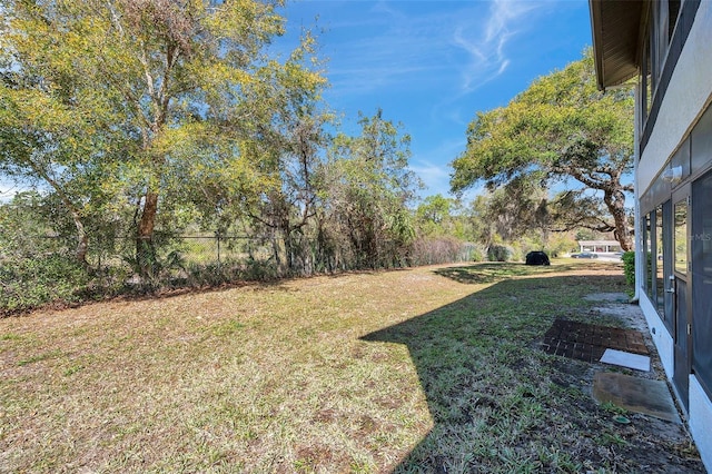 view of yard with fence