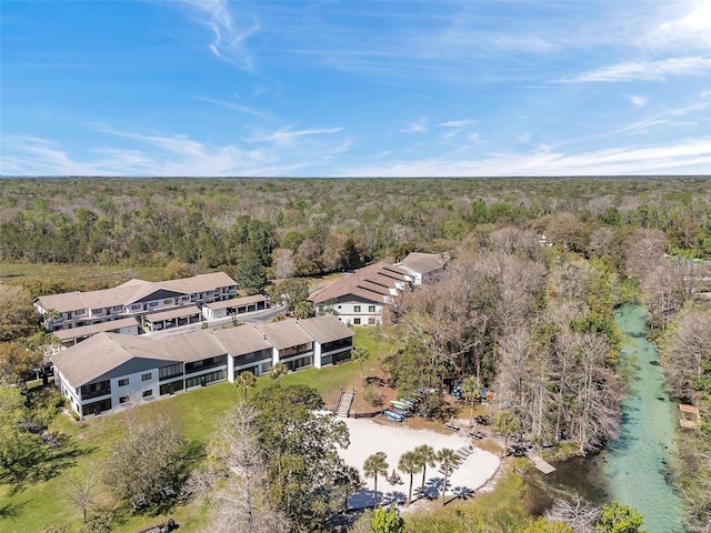 bird's eye view featuring a forest view