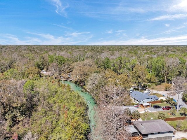 aerial view featuring a view of trees