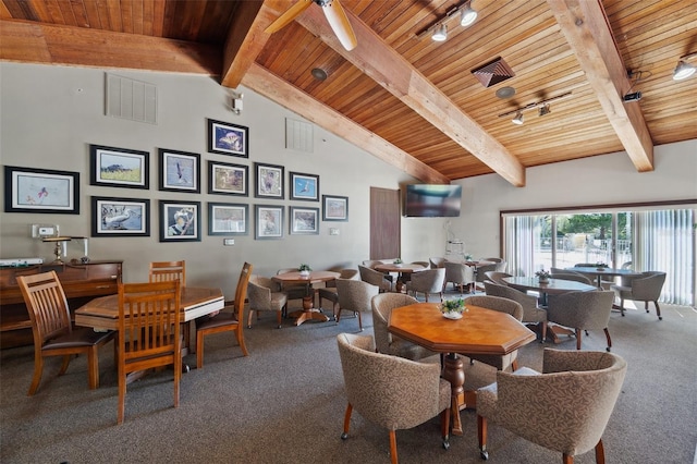 dining room with beamed ceiling, wooden ceiling, carpet flooring, and visible vents