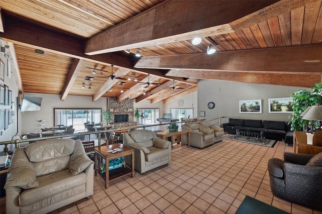 tiled living room with wood ceiling, vaulted ceiling with beams, and ceiling fan