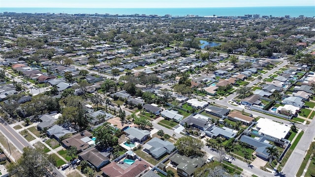 aerial view with a water view and a residential view