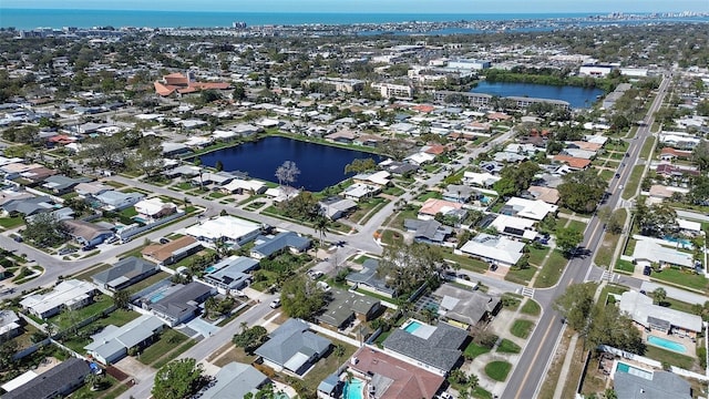 aerial view with a water view and a residential view