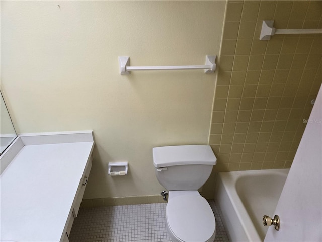 full bathroom with tile patterned floors, toilet, and vanity