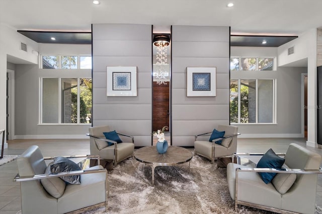 living area with plenty of natural light, recessed lighting, and visible vents