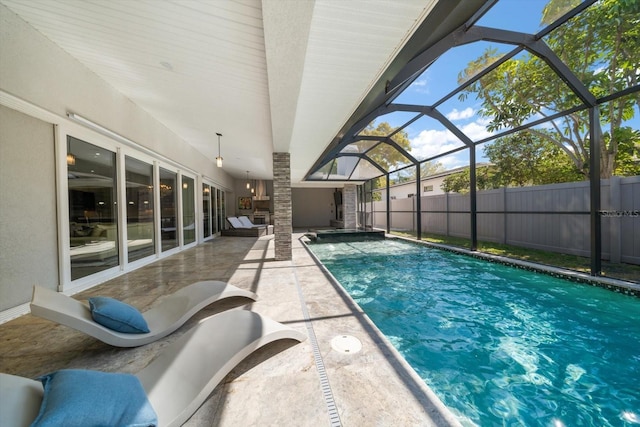 view of swimming pool featuring a patio area, a fenced in pool, glass enclosure, and fence