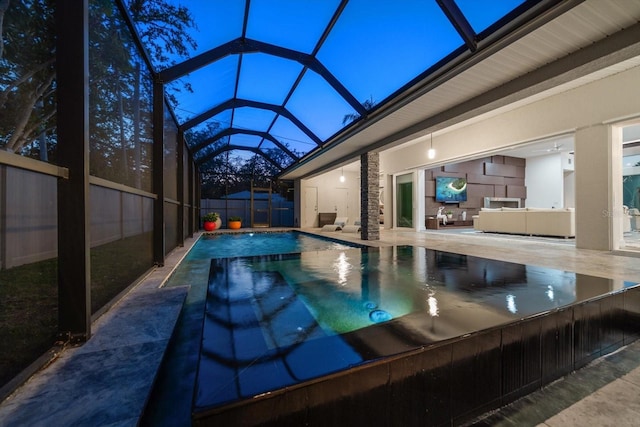 view of pool featuring a fenced in pool, a fenced backyard, outdoor lounge area, a lanai, and a patio area