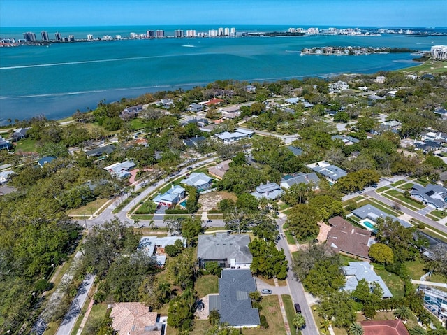 birds eye view of property featuring a residential view and a water view