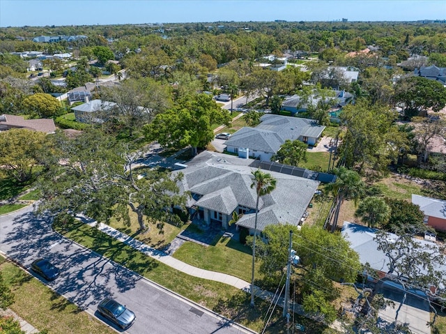 birds eye view of property with a residential view