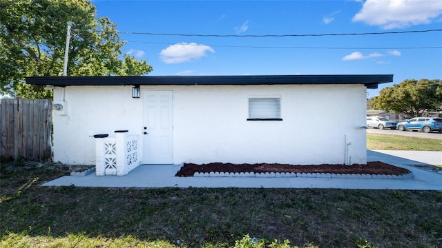 view of outdoor structure with fence