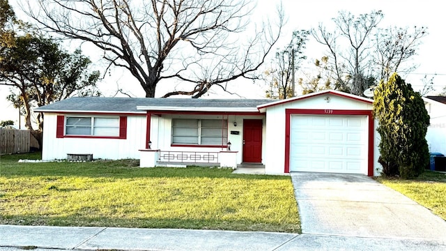 ranch-style home featuring a garage, fence, concrete driveway, and a front yard