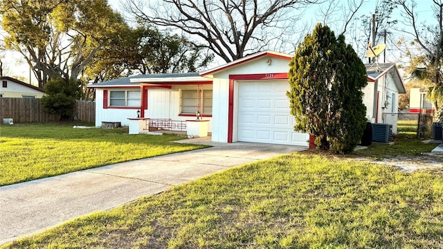 ranch-style home with a front yard, central AC, fence, a garage, and driveway