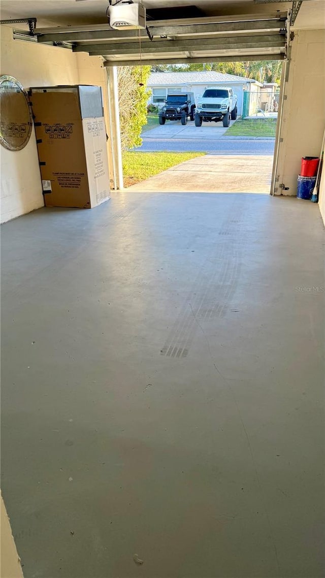 garage featuring a garage door opener