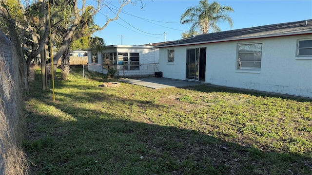 view of yard with a patio area and fence