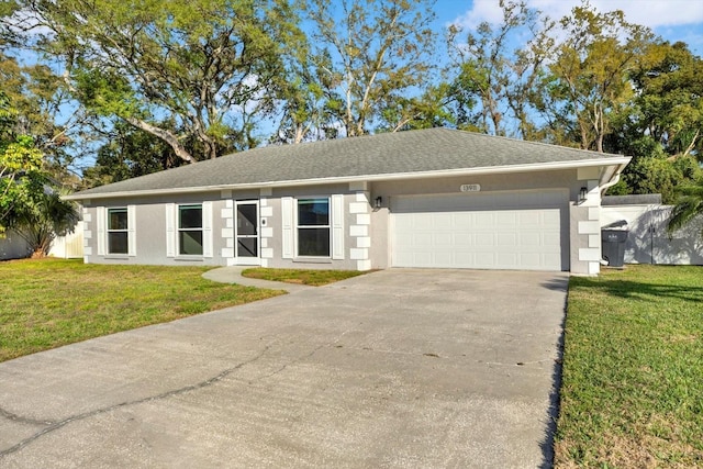 single story home with an attached garage, driveway, a front lawn, and stucco siding