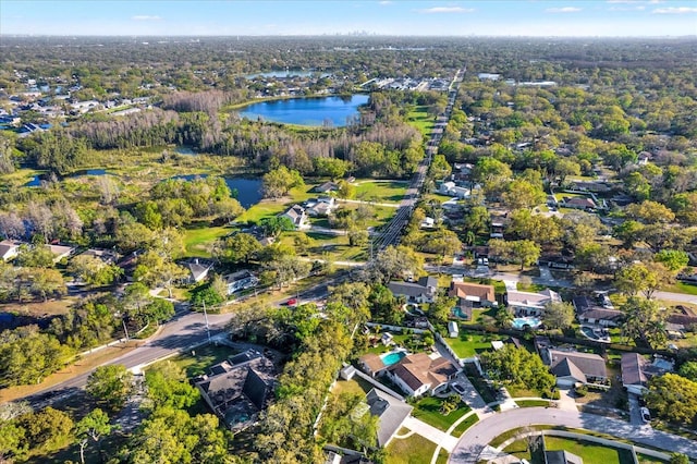 bird's eye view featuring a water view and a residential view