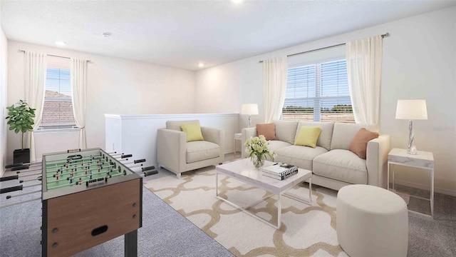 carpeted living area featuring a wealth of natural light and recessed lighting