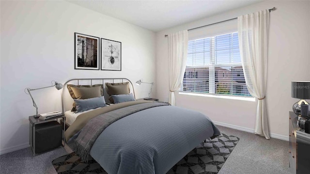 bedroom featuring carpet and baseboards