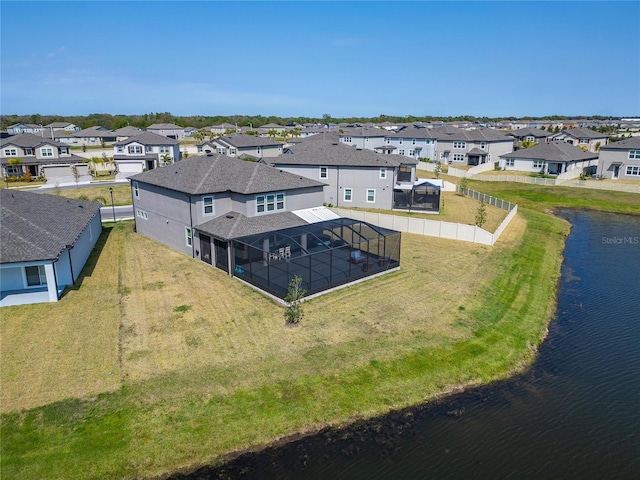 aerial view with a residential view and a water view