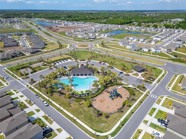 aerial view with a water view and a residential view