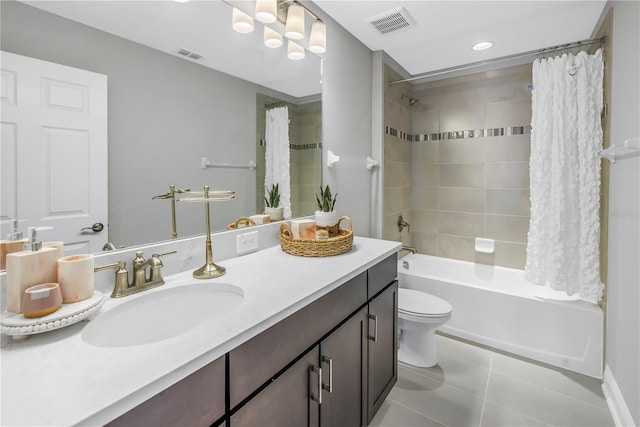 full bath featuring shower / bath combo, visible vents, toilet, and tile patterned floors