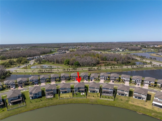 aerial view featuring a water view and a residential view