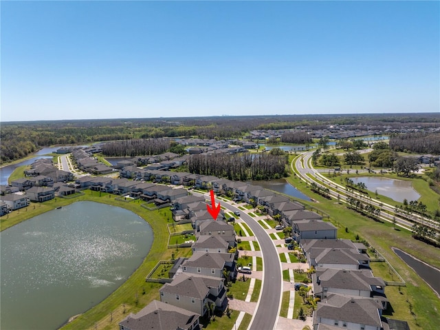 aerial view featuring a residential view and a water view