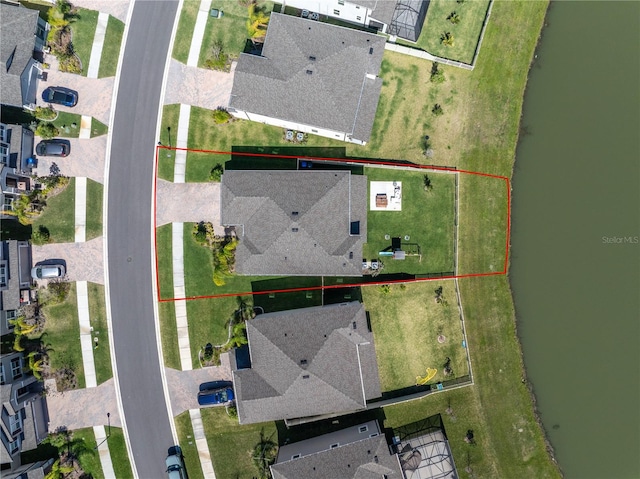 birds eye view of property with a residential view