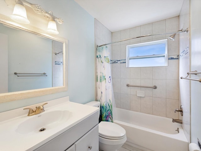 bathroom with vanity, toilet, and shower / bath combo with shower curtain