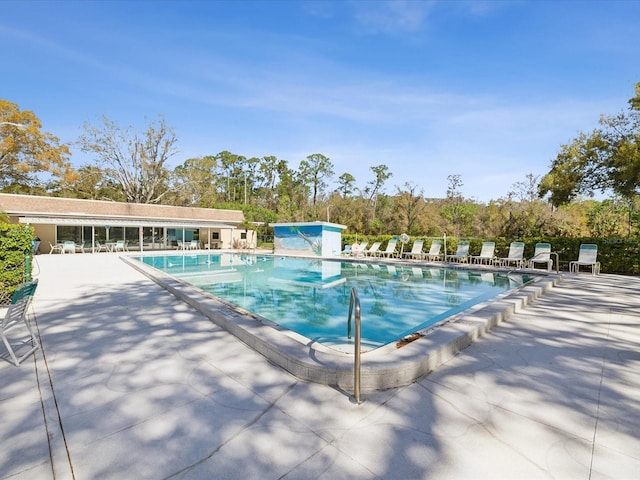 pool featuring a patio area