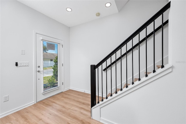 3402 E 28th Ave Unit 7, Tampa, FL 33605 - entryway featuring wood finished floors, recessed lighting, stairs, and baseboards