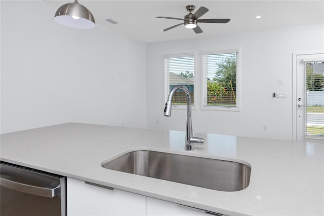 3402 E 28th Ave Unit 7, Tampa, FL 33605 - kitchen with a sink, light countertops, dishwasher, plenty of natural light, and recessed lighting
