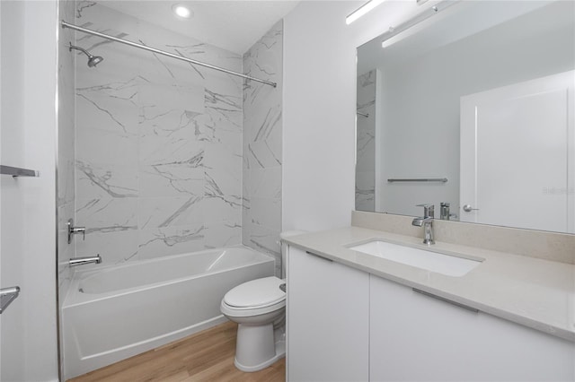 3402 E 28th Ave Unit 7, Tampa, FL 33605 - full bathroom featuring vanity, toilet, shower / washtub combination, wood finished floors, and recessed lighting
